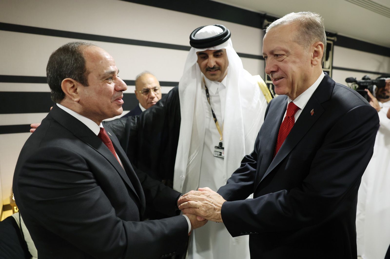 Sisi and Erdogan shake hands for first time: Will relations witness a breakthrough soon?