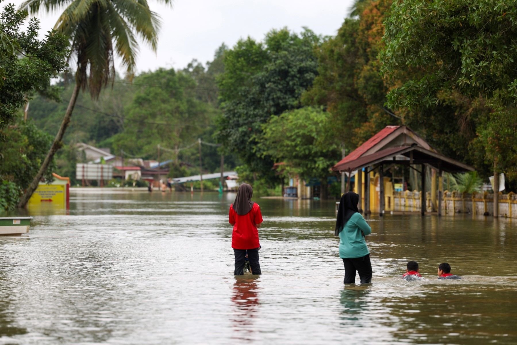 Five dead, over 70,000 evacuated in Malaysia floods